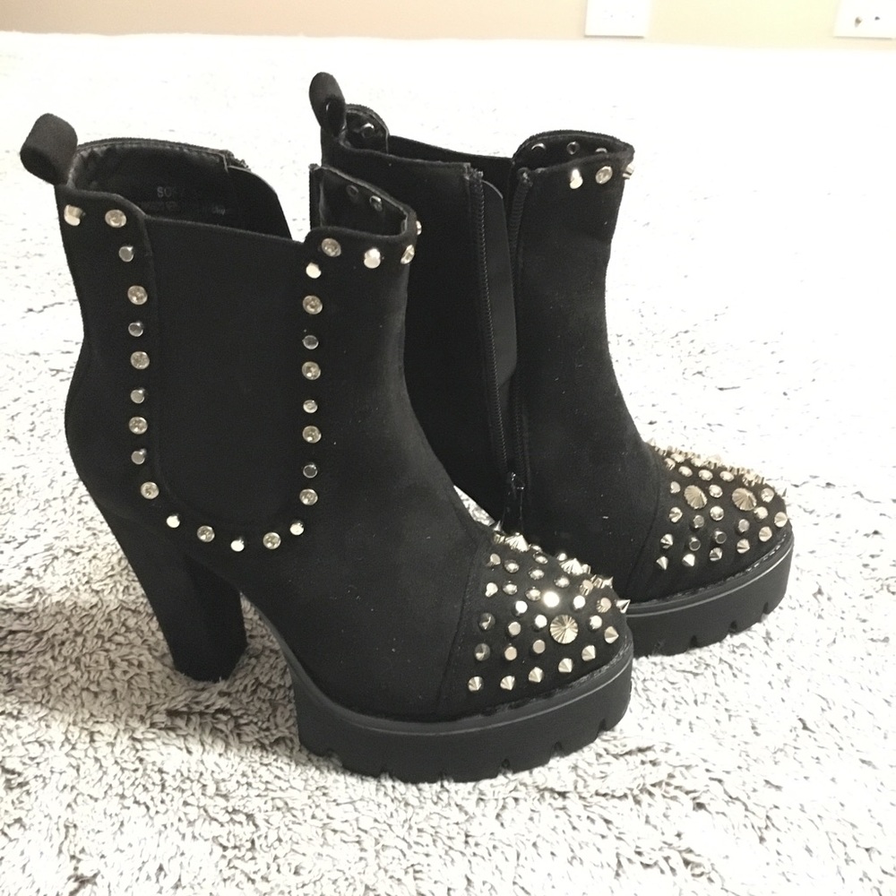 Black spiky heeled boots